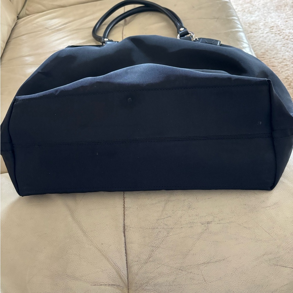 Alfred Sung lightweight canvas diaper bag.